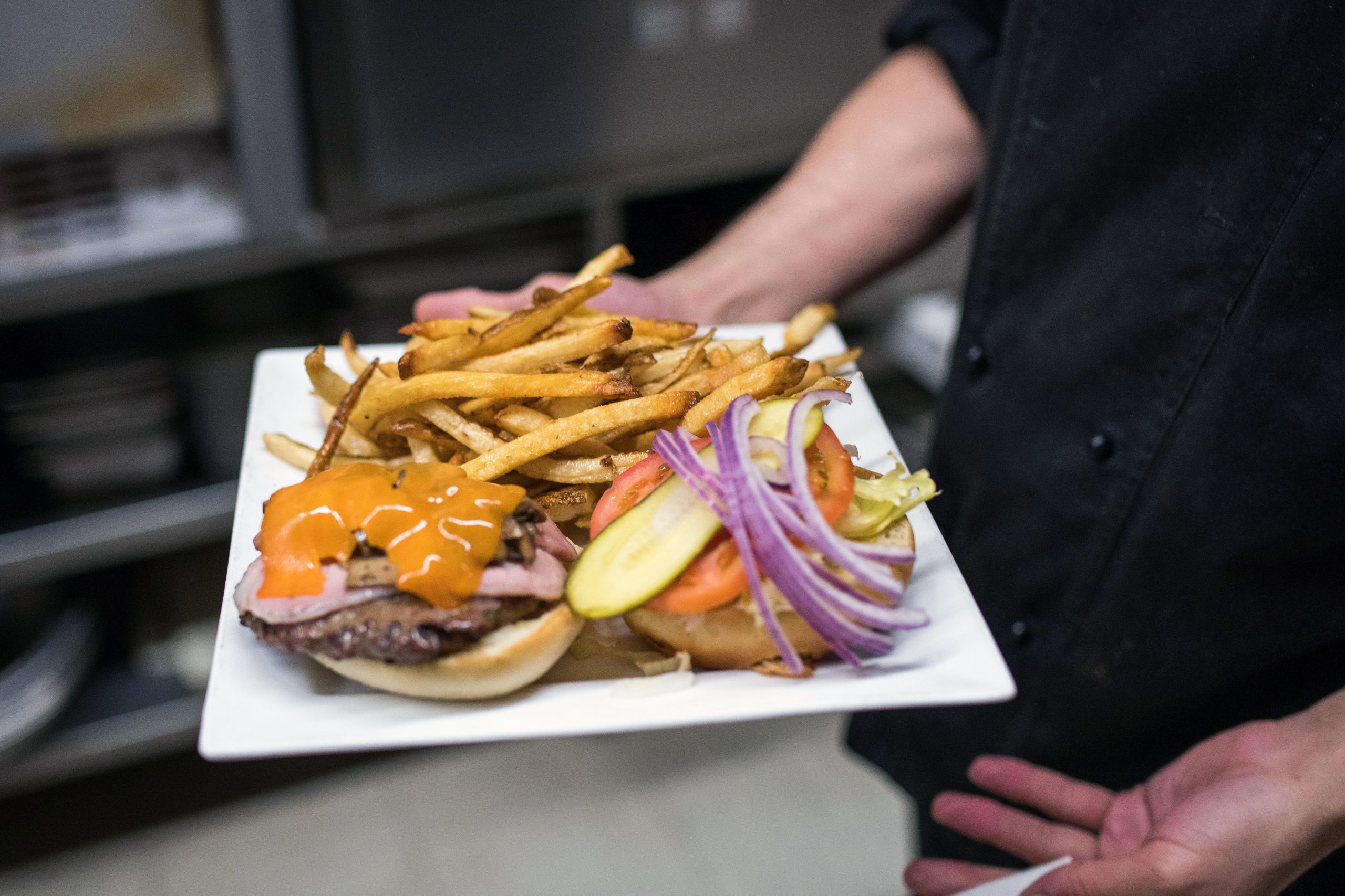 Plate full of fries and a delicious burger!