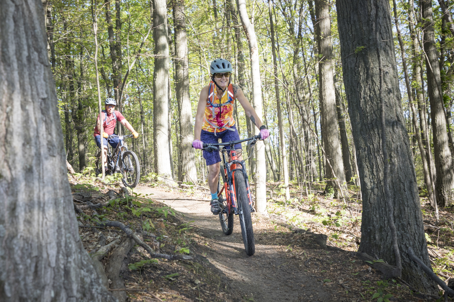 friends enjoying some forest cycling