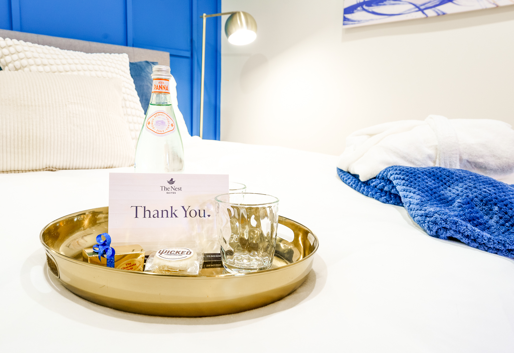 A guest welcome package from the Nest Suites.