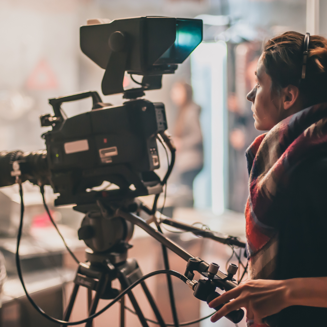 Lady filming a scene