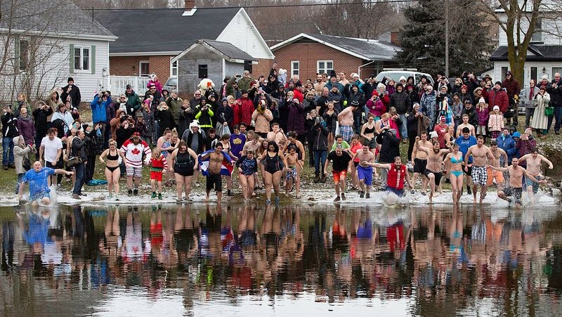 People running into the water for the Polar Bear Dip