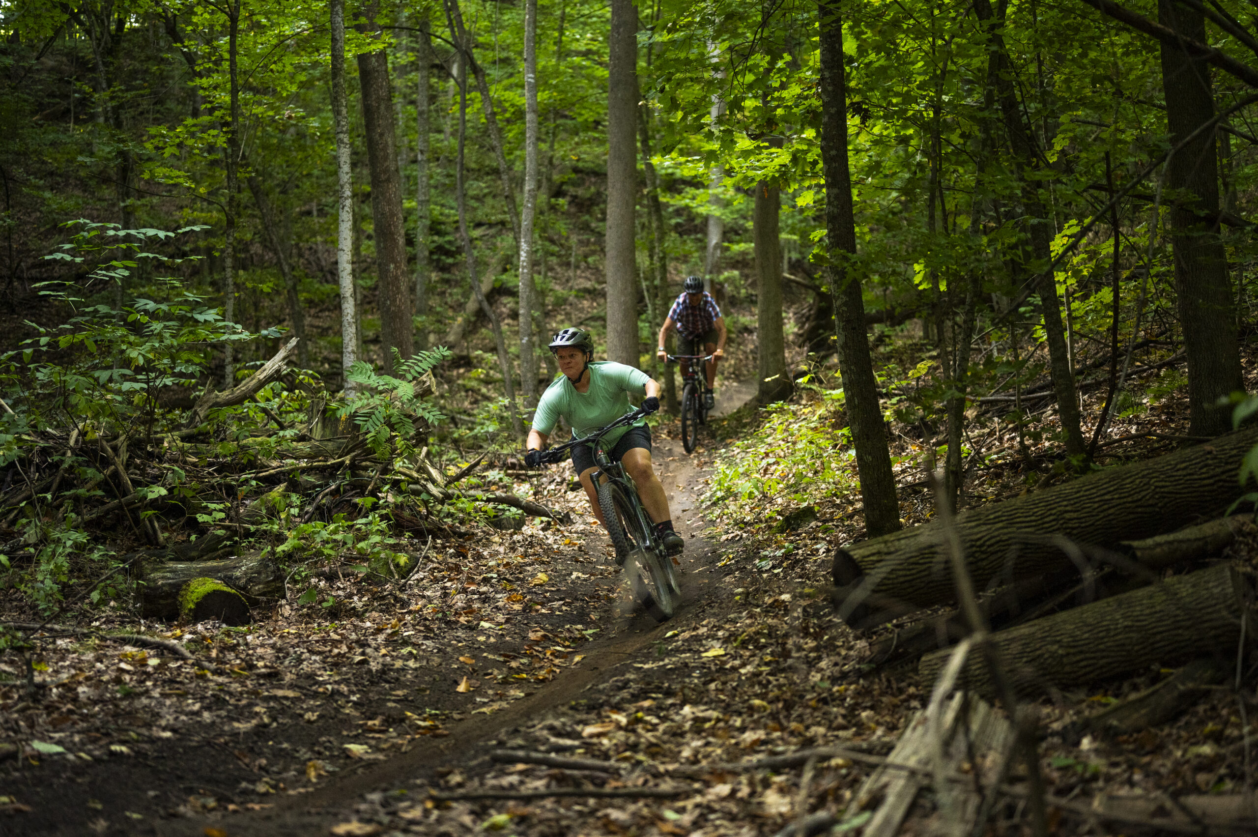 cycling in lush forest
