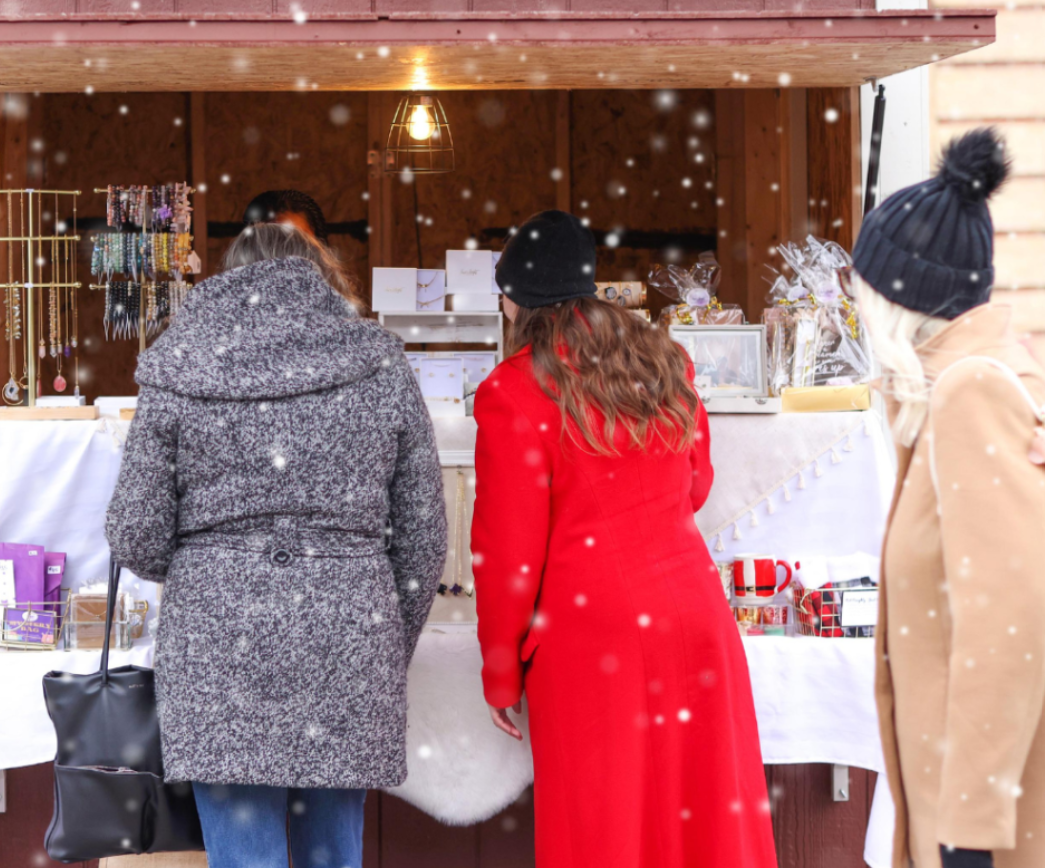 People shopping at the holiday market